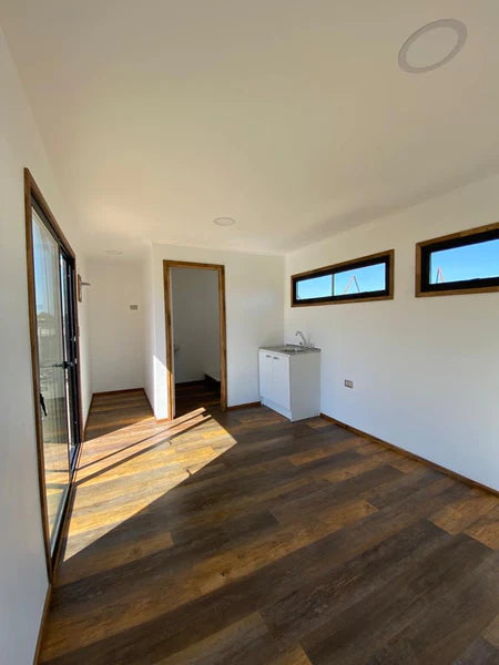 CABINA MODULARE IN NOCE 18 M²