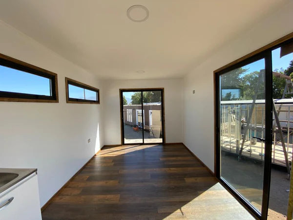 CABINA MODULARE IN NOCE 18 M²